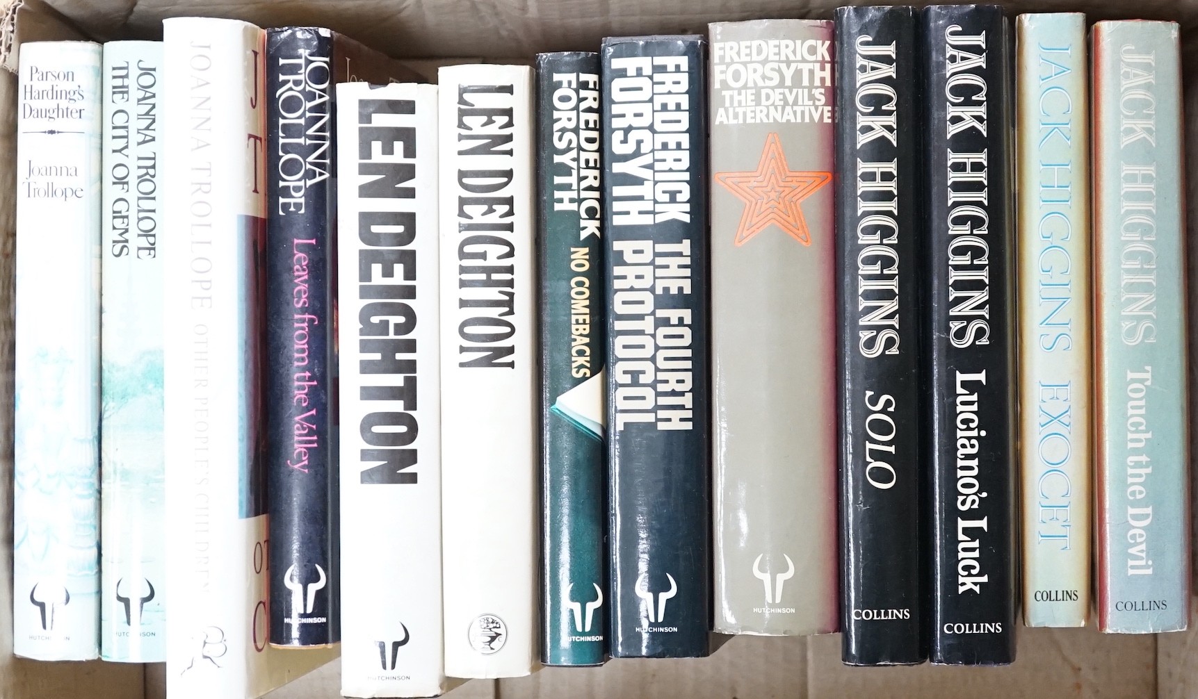 13 modern first edition novels: four Joanna Trollope, two Len Deighton, three Frederick Forsyth and four Jack Higgins.